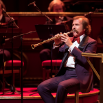 ThomasU_ron_burgundy_playing_the_jazzflute_at_royal_albert_hall_f8d6e859-e347-4dfe-9fd3-4b4ab8...png