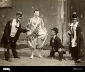 four-clowns-including-a-pierrot-and-a-dwarf-from-circus-hagenbeck-in-scheveningen-netherlands-...jpg
